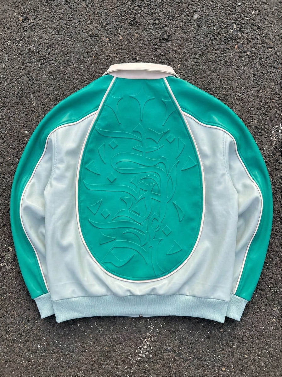 Dos de la Veste Three 60 Mint epok, broderie calligraphique haute densité